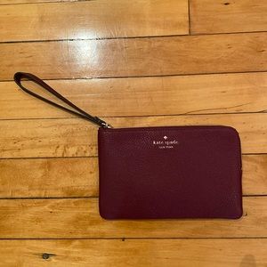 Kate Spade burgundy wristlet